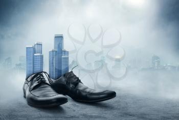 Office buildings in the male classic shoes against the city