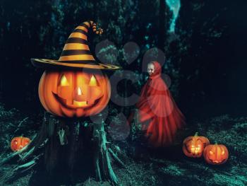 Little girl in a red gown in the forest with Helloween pumpkins