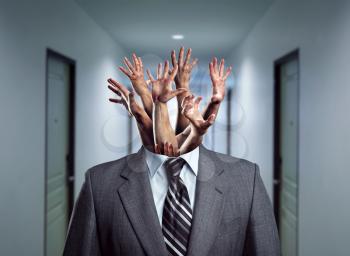 Businessman with many hands instead of the head