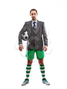Businessman in sportwear with a ball isolated on white