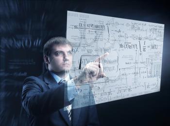 Businessman working with numbers is thinking looking at the board