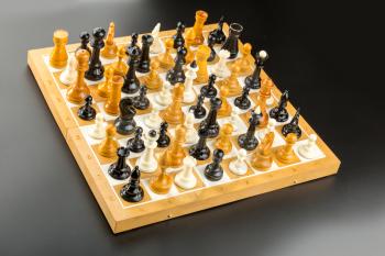 Many chess figures standing on the board