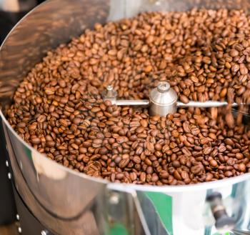 A lot of coffee beans in the roasting machine