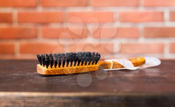One barber's brush on the wooden table