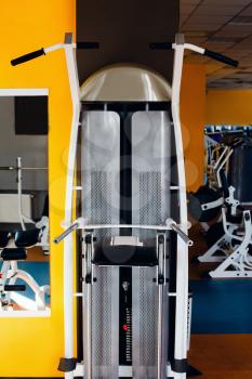 Close up of modern sport machine handle in the gym