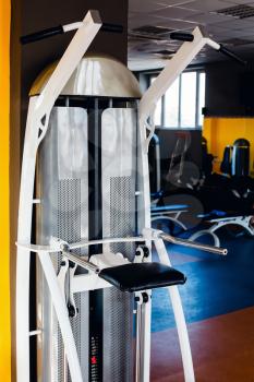 Side view of a new sport machine in the modern gym