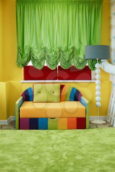 Kindergarten room decorated with colorful sofa. Preschool  playroom concept.