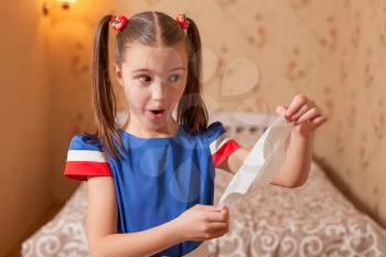 Little kid has found panty liners in parents bedroom.