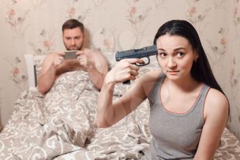 Wife trying to commit suicide because of husband use his phone in bed all the time. Family life problems.