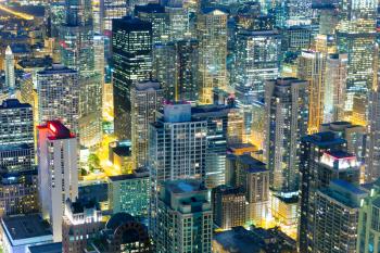 Skyscraper buildings in steel, concrete and glass, night view, Chicago, Illinois USA