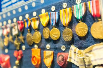 Medals and awards of armed forces. Museum exhibit of insignia signs.
