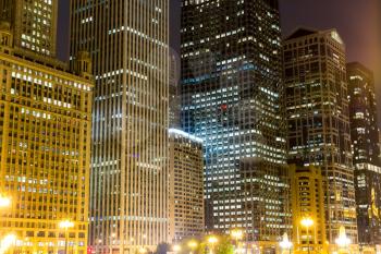 Night view of illuminated business center. Night urban life.