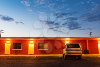 USA roadside motel in the night. Historic american car travel routes.