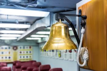 Navy ship bell. Golden marine bell in museum .