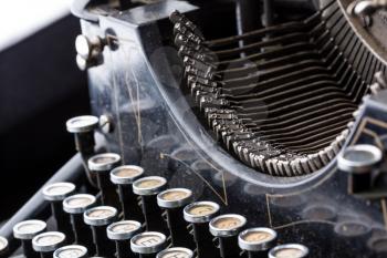 Vintage typewriter type bars closeup. Old type writer concept