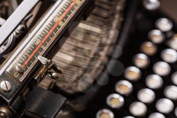 Vintage grunge typewriter line, type bars and keys closeup image.