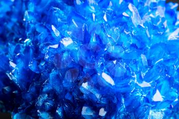 Blue icy salt crystal closeup.  Sulphate macro photo