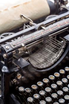 Vintage grunge typewriter closeup image. Old type writer concept