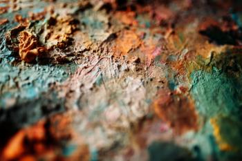 Acrylic paints mix closeup view. Painter palette macro