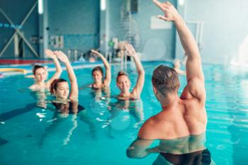 Aqua aerobics in water sport center, indoor swimming pool, recreational leisure