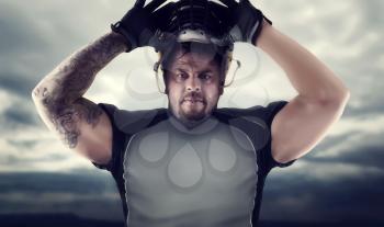 Muscular american football player against dark sky, men sport. National league