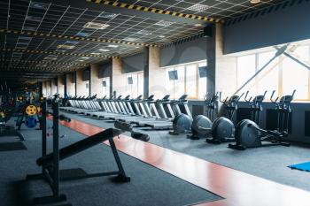 Gym nobody, empty fitness club. Gymnastic exercisers. Sport center equipment