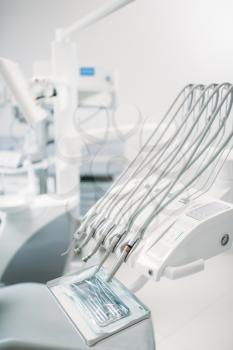 Dental equipment in dentistry clinic, stomatology cabinet interior, nobody. Dentist tools, orthodontist workplace