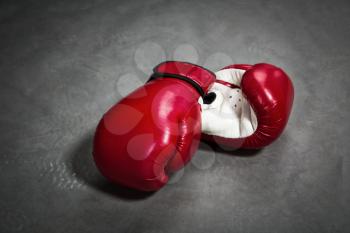 Red boxing gloves. Fighting sport concept, box symbol