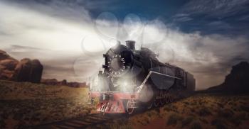 Old steam train, travel in valley. Vintage locomotive. Railway engine, ancient railroad vehicle