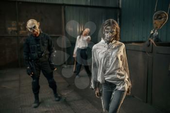 Zombies looking for fresh meat in abandoned factory, scary place. Horror in city, creepy crawlies attack, doomsday apocalypse
