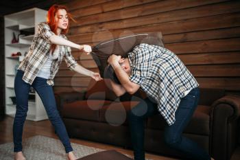 Young couple in conflict, man and woman fight. Husband and wife quarrel. Problem relationship