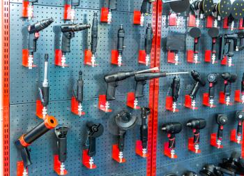 Professional pneumatic wrench, car repair shop. Tire and auto service equipment