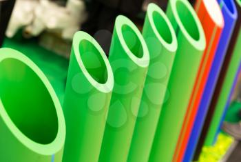 Plastic water pipes in a cut closeup, polypropylene tube, plumbing equipment