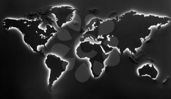  Illuminated earth map on black background. Continents shapes with cool white backlight