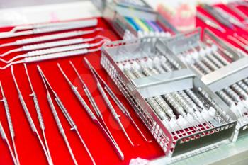 Medicine equipment, dental instrument macro view. Dentist cabinet, stomatology. Tooth care, mouth hygiene