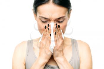 Painful woman with runny nose, snot or flu, white background. Female person in lingerie, medical advertising or concept