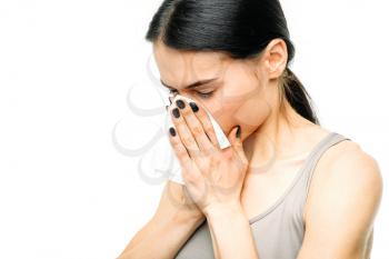 Painful woman with runny nose, snot or flu, white background. Female person in lingerie, medical advertising or concept