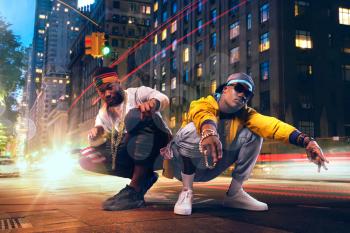 Two black rappers dancing on city street, car lights exposure effect. Rap performers against cityscape, underground music lifestyle, urban style