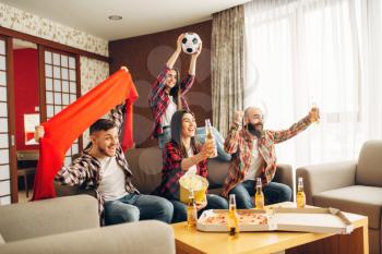 Smiling friends cheer for their favorite team, football fans. Group of people wathing tv broadcast at home. Cheerful company celebrate goal