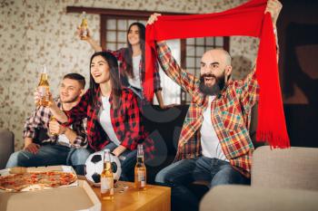 Friends wathing tv broadcast at home, football fans. Group of people cheer for their favorite team, decisive match. Cheerful company celebrate goal