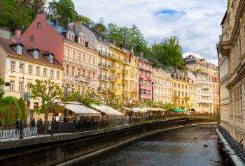 City river and outdoor cafes, Karlovy Vary, Czech Republic, Europe. Old european town, famous place for travel and tourism