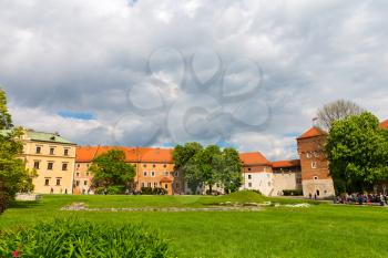 Courtyard lawn in Wawel castle, Krakow, Poland. European town with ancient architecture, famous place for travel and tourism