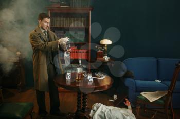 Male detective puts murder weapon in a bag, evidence at the crime scene, retro style. Criminal investigation, inspector is working on a murder, vintage room interior on background
