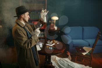 Male detective takes fingerprints from bottle at the crime scene, retro style. Criminal investigation, inspector is working on a murder, vintage room interior on background