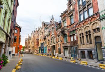Empty street, ancient building facades, old European town. Summer tourism and travels, famous europe landmark, popular places for travelling