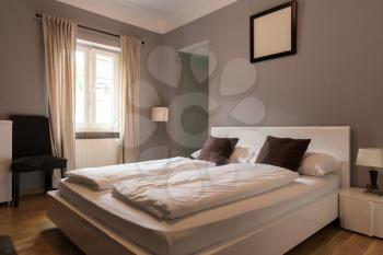 Hotel room interior, bedroom, Europe tourism. European motel furniture, apartment for comfortable leisure, nobody