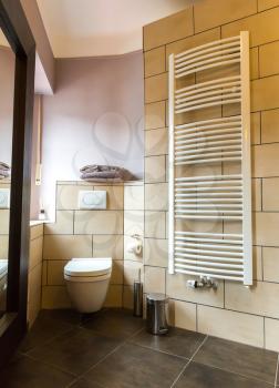 Hotel bathroom interior, bath, Europe tourism. European motel furniture for personal hygiene, apartment for comfortable leisure, nobody