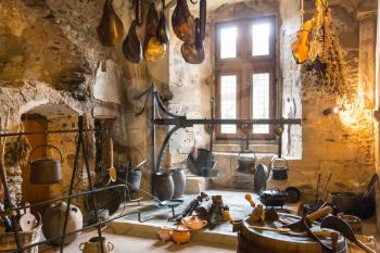 Vintage kitchen interior in ancient castle, Europe. Traditional european architecture, famous places for tourism and travel, medieval cuisine