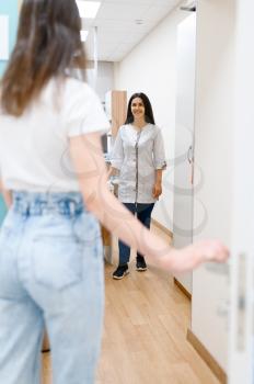 Female dentist and patient in clinic, stomatology. Doctor in uniform, woman at appointment, medical worker, medicine and health, professional teeth care, dentistry