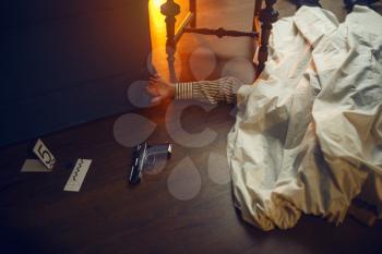 Dead man, victim and murder weapon, evidence at the crime scene, retro style. Criminal investigation, inspector is working on a murder, vintage room interior on background